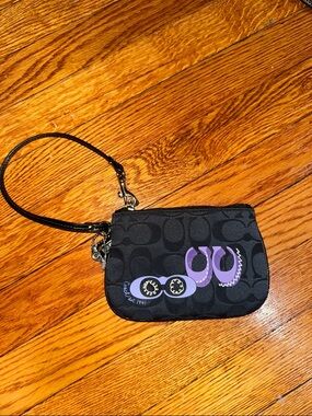 Coach Black Wristlet with Purple Graphic Accent